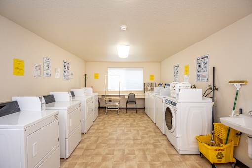 the laundry room is equipped with washes and dryers