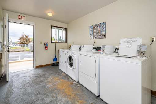 A laundry room with a washer and dryer.