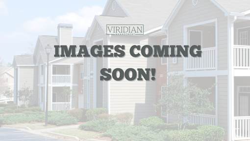 A row of houses with the text "Images Coming Soon!" overlaid on the image.