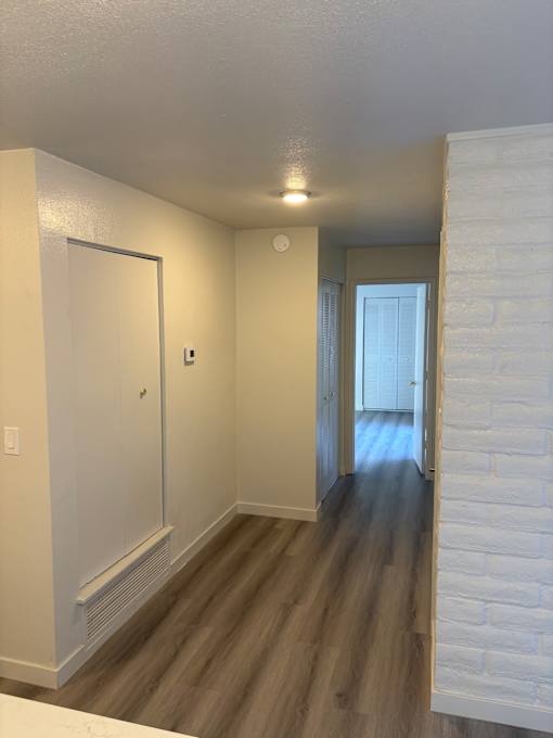 A white door is on the left side of the image.