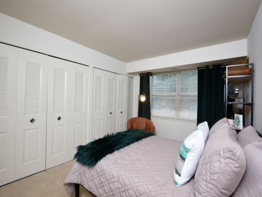 Comfortable Bedroom With Accessible Closet at Woodridge Apartments, Maryland, 21133
