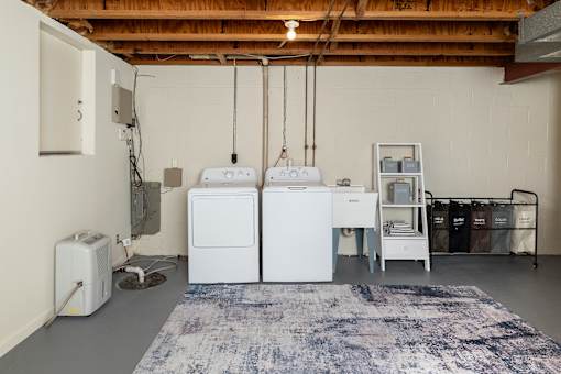 Full size washer and washer in basement
