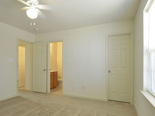 Third bedroom with plush carpet at The Pointe at Manorgreen Townhomes, Baltimore, MD 21220
