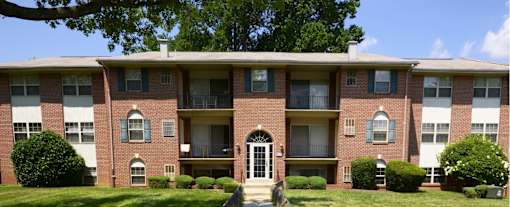 A red brick apartment building at Woodridge Apartments, Randallstown, 21133