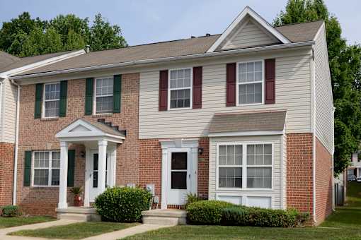 Exterior view of front of townhomes at Carlson Woods Townhomes, Baltimore, MD, 21244