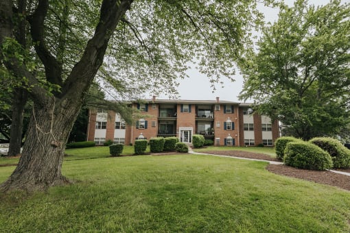 Exterior of building with plush landscape and greenery in Randallstown, MD 21133.