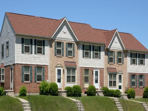 Walnut Grove Townhomes  exterior with front lawn at Walnut Grove Townhomes* Apartments, Essex, 21221