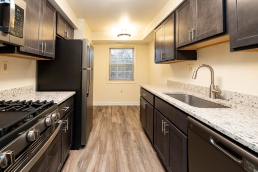 Kitchen with Black appliance at Seminary Roundtop Apartments, Lutherville, Maryland, 21093