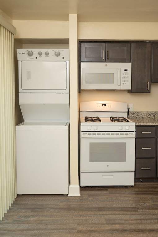 Washer and Dryer next to the kitchen at The Orchards at Severn Townhomes*, Severn, MD 21144