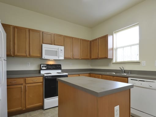 Huge kitchen with built in center island and natural light at The Pointe at Manorgreen Townhomes, Baltimore, 21220
