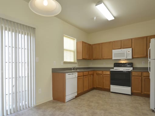 Massive kitchen with plenty of food storage and eat in area at The Pointe at Manorgreen Townhomes, Baltimore