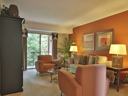 Large living room with private balcony at Liberty Gardens Apartments, Maryland, 21244