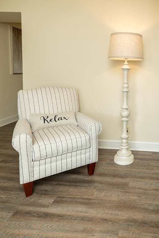 Living Room Chair at The Brittany Apartments, Pikesville
