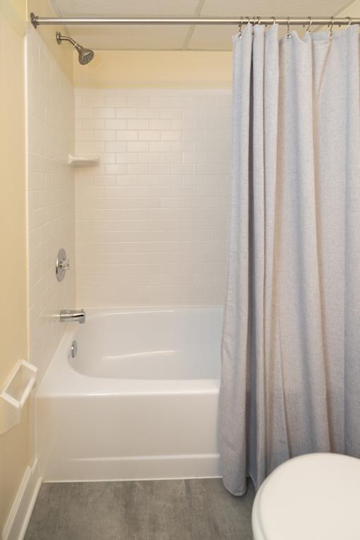 Bathroom with a tub-shower at Ivy Hall Apartments*, Towson, MD 21204