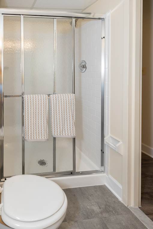 Bathroom with walk-in shower at Ivy Hall Apartments*, Towson, MD 21204.