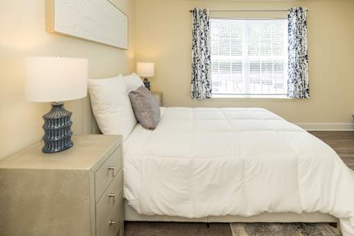 Bed with pillows at The Brittany Apartments, Pikesville, MD, 21208