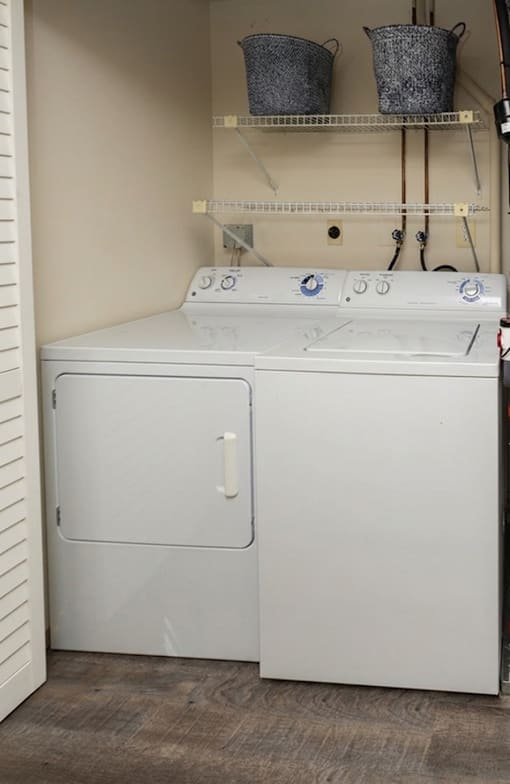 Full sized side by side washer and dryer at Spring Hill Apartments & Townhomes, Baltimore, MD 21234.