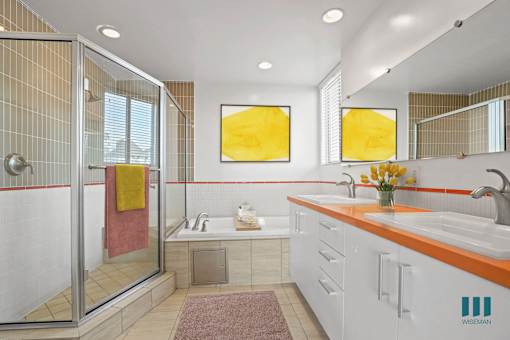 Bathroom with Walk-In Shower, Bathtub, and Double-Sink Vanity with Cabinet Storage