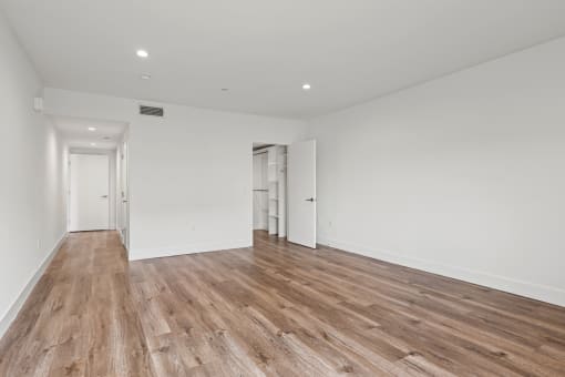 Bedroom with Walk_In Closet with Built-In Organizers