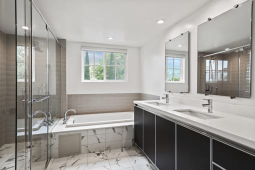 Bathroom with Bathtub, Walk-In Shower, and Double-Sink Vanity