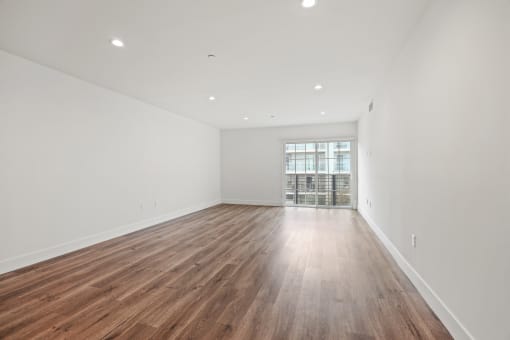 Living Room with Recessed Lighting, Vinyl Flooring, and Balcony