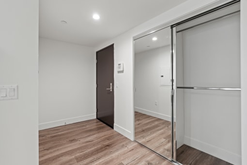 Front Entrance with Mirrored Hall Closet