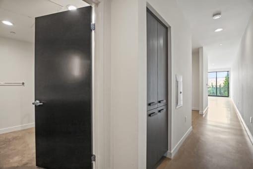 Open-Concept Floor Plan with Hall Storage Cabinets and Bathroom