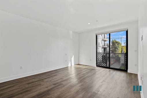Living Room with Recessed Lighting, Vinyl Flooring, and Balcony