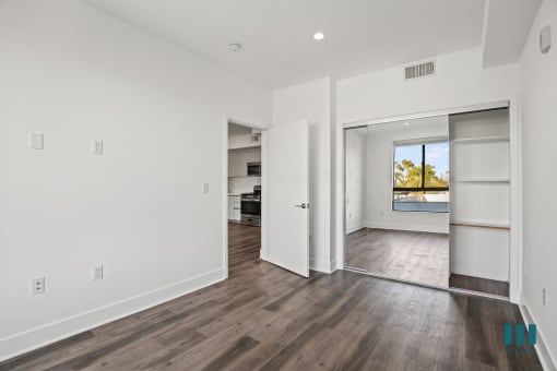 Bedroom with Mirrored Closet with Built-In Shelving