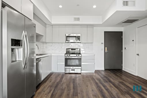 Front Entrance and Kitchen with Energy-Efficient Appliances