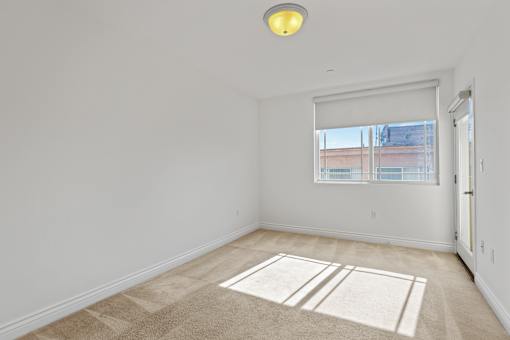 Bedroom with Patio and Windows