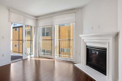 Living Room with Electric Fireplace, Patio with Window Shades