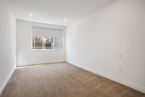 Bedroom with Recessed Lighting and Large-Size Windows