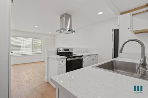 Open-Concept Kitchen, Dining, and Living Room Space