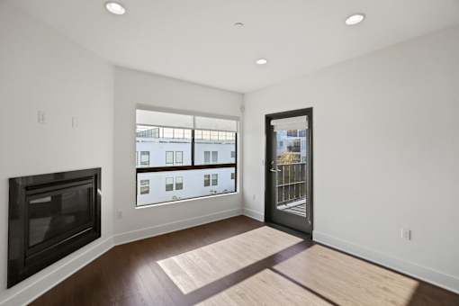 Living Room with Electric Fireplace, Recessed Lighting, Vinyl Flooring, and Patio