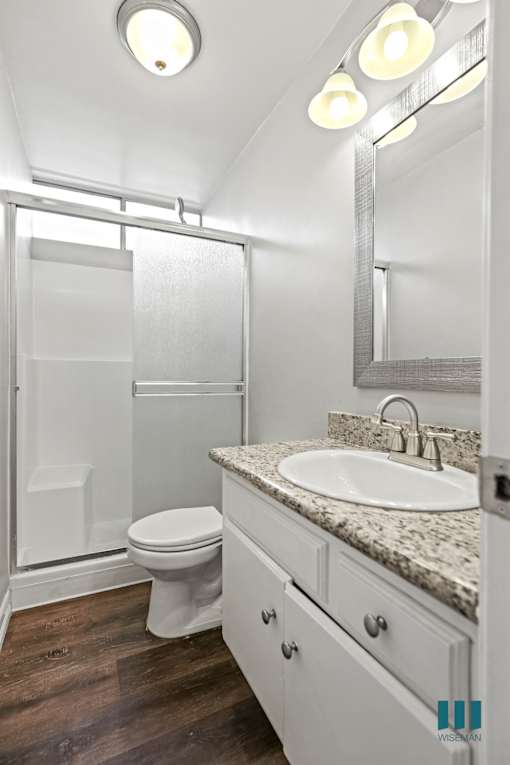 Bathroom with Walk-In Shower and Vanity Cabinet Storage