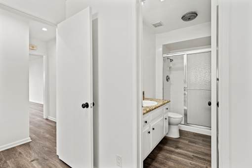 Bedroom with Bathroom with Shower Bath and Glass Door