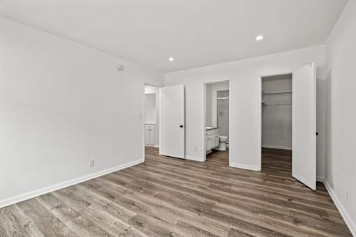Bedroom with Bathroom and Walk-In Closet