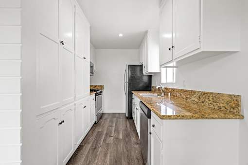 Full-Size Kitchen with Energy-Efficient Appliances and Ample Cabinet Storage
