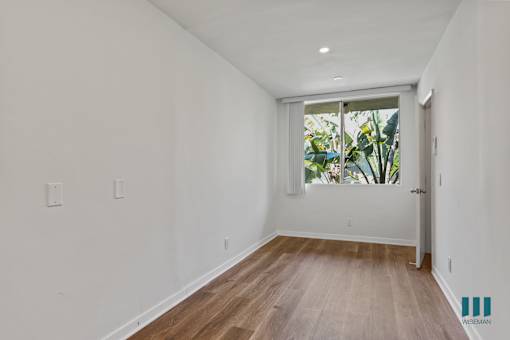 Bedroom with Windows, Vinyl Flooring, and Recessed Lighting