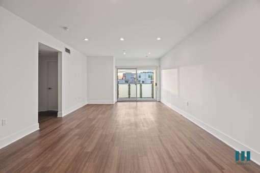 Open-Concept Dining and Living Room with Patio