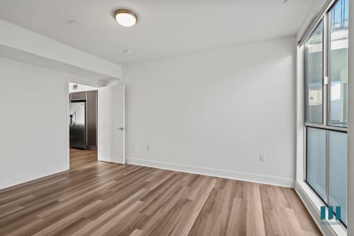 Bedroom with Large-Size Windows and Vinyl Flooring