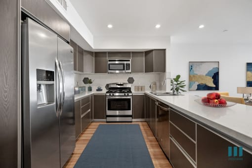 Full-Size Kitchen with Stainless-Steel Appliances and Ample Cabinet Storage