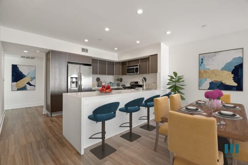 Open-Concept Kitchen with Countertop Bar and Dining Space