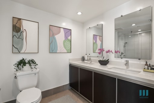 Bathroom with Double-Sink Vanity and Cabinet Storage
