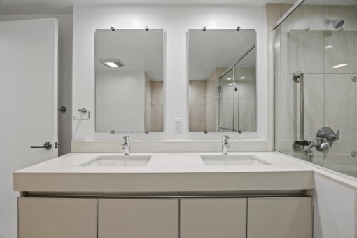 Bathroom with Double-Sink Vanity and Cabinet Storage