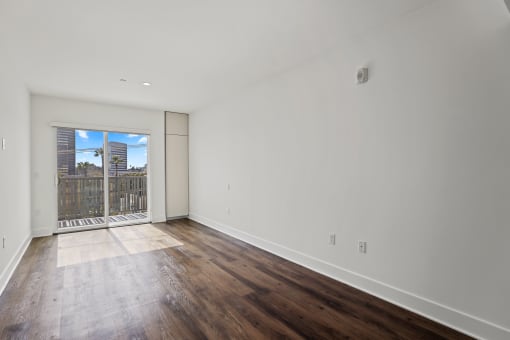 Living Room with Patio and Built-In Cabinet Storage