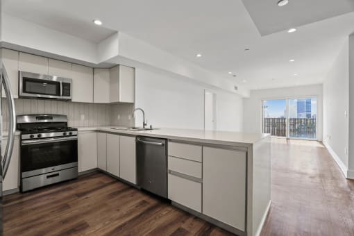 Open-Concept Kitchen, Dining, And Living Room Space