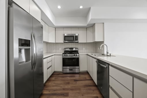 Kitchen with Energy-Efficient Refrigerator, Stove, Microwave Oven, and Dishwasher