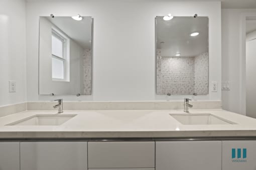 Bathroom with Double-Sink Vanity and Cabinet Storage